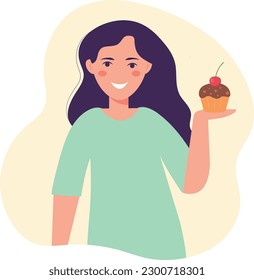 No diet day. A woman holds a plate of cupcake in her hands.