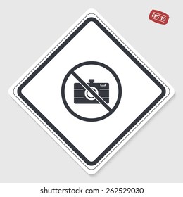 No entry with a camera. Prohibitory sign. Photo camera icon. Flat design style. Made vector illustration. Emblem or label with shadow.