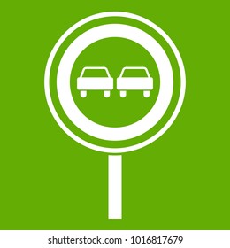No overtaking sign icon white isolated on green background. Vector illustration