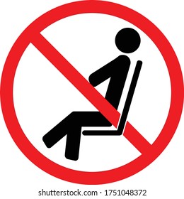 No sitting. Do not sit here. Do not sit on surface. Prohibition sign. Black forbidden symbol in red round shape. Safety sign. Social distancing sign. Safety sign to stop the spread of Coronavirus. 