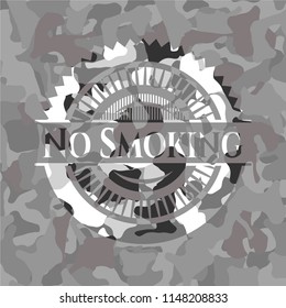 No Smoking written on a grey camouflage texture