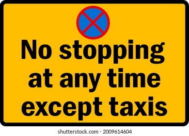 No stopping at any time except taxis sign. Black on yellow background. Traffic signs and symbols.