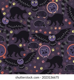 Nocturnal animals seamless pattern design. Creative graphic print with owl, hedgehog, raccoon,  lemur. Purple color palette. Decorative background. Wallpaper with night fauna. Animals at night. 