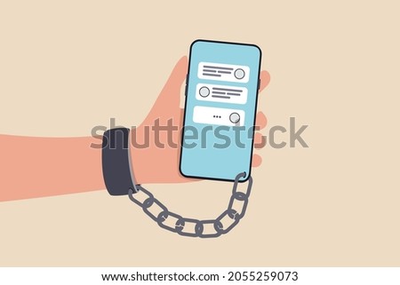 Nomophobia or no mobile phone phobia, smartphone and social media addicted or fear of missing out concept, young people with handcuff chained with mobile phone with chat and social media applications.