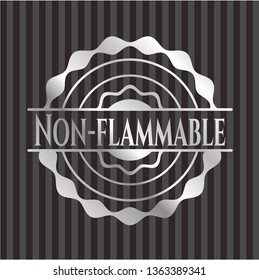 Non-flammable silver emblem or badge