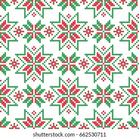 Nordic background. Christmas ornament. Vector seamless pattern. Cross stitch. Template of knitting and embroidery.