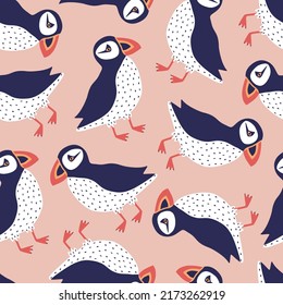 Nordic puffins hand drawn vector illustration. Cute Icelandic birds in flat style seamless pattern for kids fabric or wallpaper.