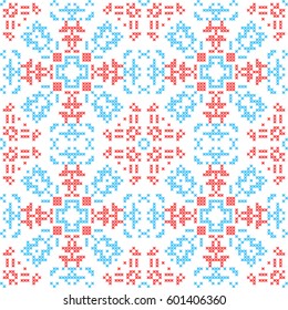 Nordic seamless pattern. Cross stitches snowflakes. Winter background.