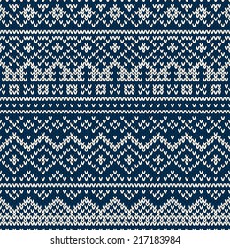 Nordic traditional Fair Isle style seamless pattern on the wool knitted texture