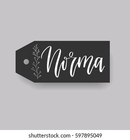 Norma - common female first name on a tag, perfect for seating card usage. One of wide collection in modern calligraphy style.
