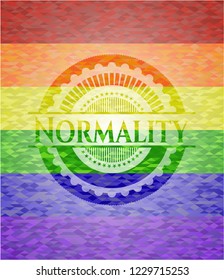 Normality emblem on mosaic background with the colors of the LGBT flag