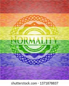 Normality emblem on mosaic background with the colors of the LGBT flag