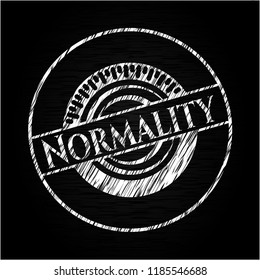 Normality written on a chalkboard