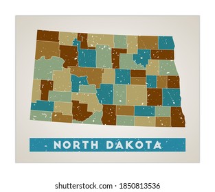 North Dakota map. US state poster with regions. Old grunge texture. Shape of North Dakota with US state name. Artistic vector illustration.