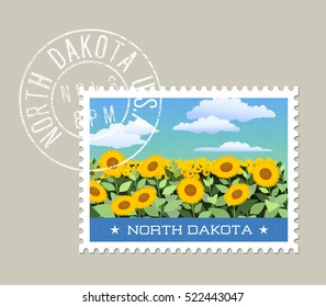 North Dakota postage stamp design. 
Vector illustration of field of sunflowers. Grunge postmark on separate layer