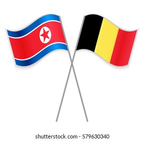 North Korean and Belgian crossed flags. North Korea combined with Belgium isolated on white. Language learning, international business or travel concept.