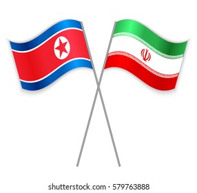 North Korean and Iranian crossed flags. North Korea combined with Iran isolated on white. Language learning, international business or travel concept.
