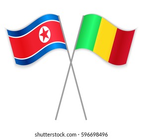 North Korean and Malian crossed flags. North Korea combined with Mali isolated on white. Language learning, international business or travel concept.