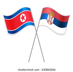 North Korean and Serbian crossed flags. North Korea combined with Serbia isolated on white. Language learning, international business or travel concept.
