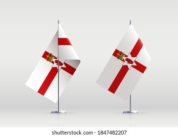 Northern Ireland flag state symbol isolated on background national banner. Greeting card National Independence Day of the part of the United Kingdom. Illustration banner with realistic state flag.