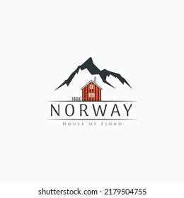 Norway fjord house on snow mountain background logo design. Fjord house rentals logo concept. Norway vacation emblem design.