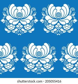 Norwegian folk art seamless white pattern on blue background 