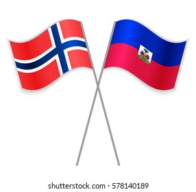 Norwegian and Haitian crossed flags. Norway combined with Haiti isolated on white. Language learning, international business or travel concept.