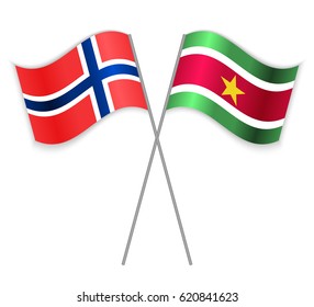 Norwegian and Surinamese crossed flags. Norway combined with Suriname isolated on white. Language learning, international business or travel concept.