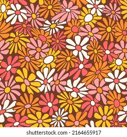 Nostalgic retro 70s groovy print. Hippie style vector seamless pattern.Vintage floral background. Textile and surface design in old fashioned colors