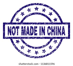 NOT MADE IN CHINA stamp seal watermark with grunge texture. Designed with rectangle, circles and stars. Blue vector rubber print of NOT MADE IN CHINA label with grunge texture.