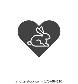 Not tested on animals black glyph icon. Label with rabbit and heart sign. Cruelty Free sign. Pictogram for web page, mobile app, promo. UI UX GUI design element.