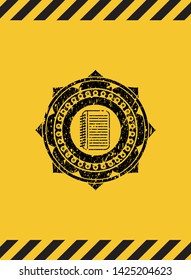 note book icon grunge black emblem with yellow background, warning sign. Vector Illustration. Detailed.