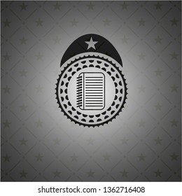 note book icon inside black emblem
