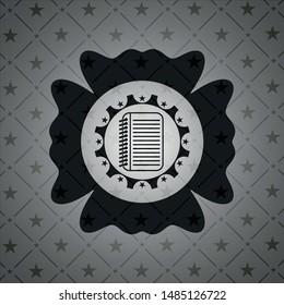 note book icon inside black emblem
