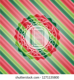 note book icon inside christmas emblem background.