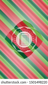 note book icon inside christmas style emblem.