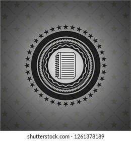 note book icon inside dark emblem
