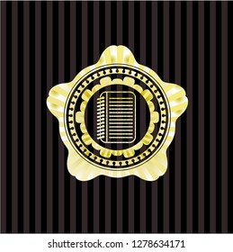 note book icon inside gold emblem or badge