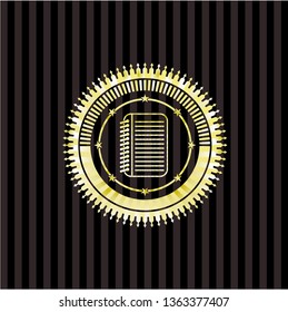 note book icon inside gold emblem or badge