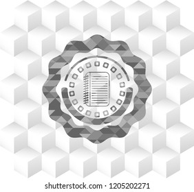 note book icon inside grey badge with geometric cube white background