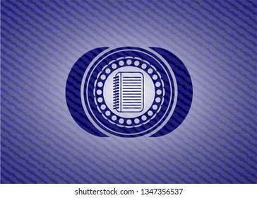 note book icon inside jean background