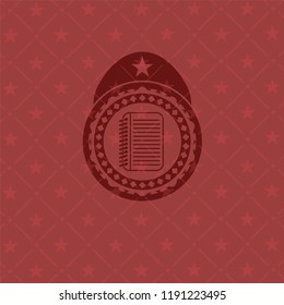 note book icon inside realistic red emblem