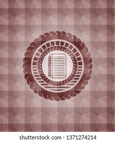 note book icon inside red seamless badge with geometric pattern background.