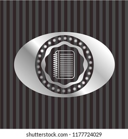 note book icon inside silvery shiny badge