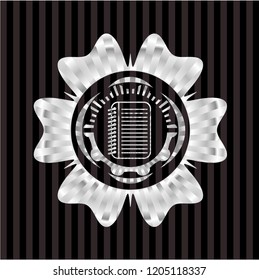 note book icon inside silvery emblem