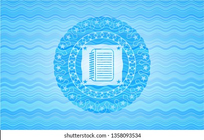 note book icon inside water concept emblem background.