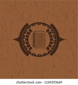 note book icon inside wood signboards