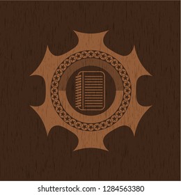 note book icon inside wood emblem. Vintage.