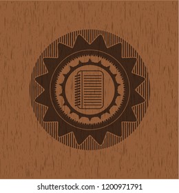 note book icon inside wooden emblem. Vintage.