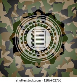 note book icon on camouflage texture